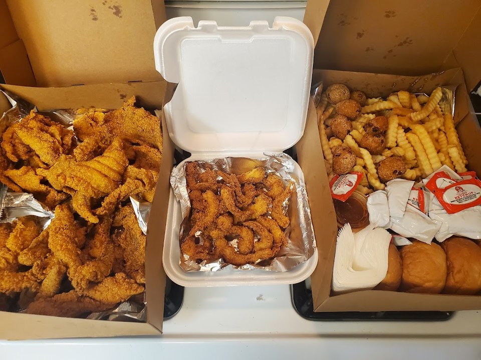 Lunch special board with shrimp and fish combos.