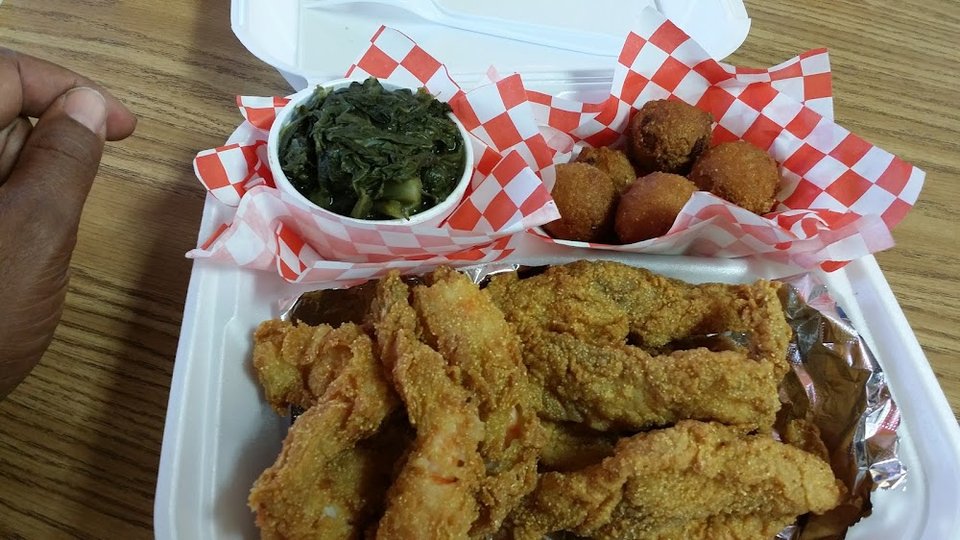 Lunch special board with shrimp and fish combos.