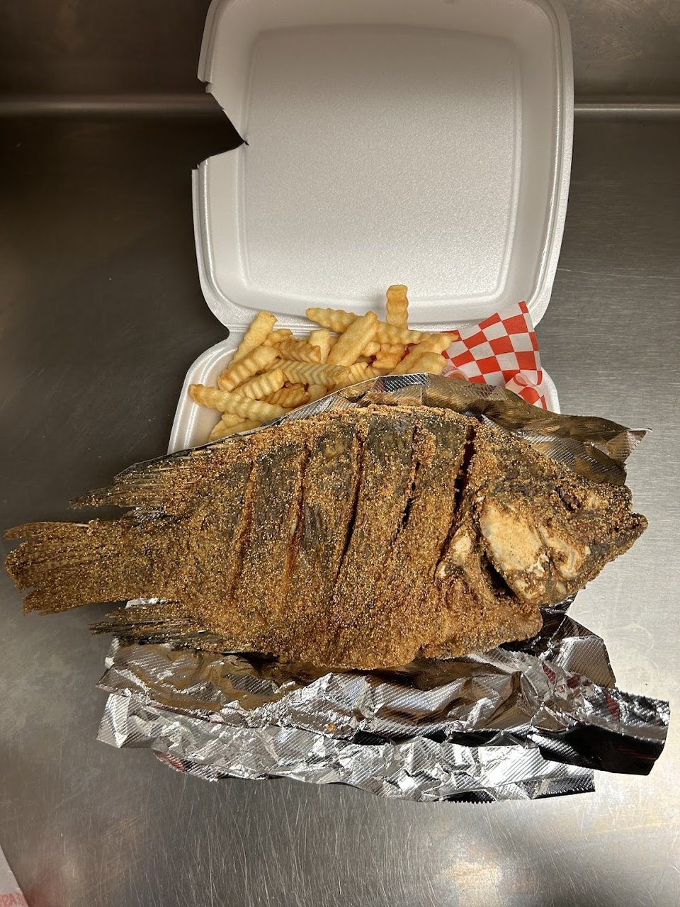 Seafood menu listing fried and grilled options.