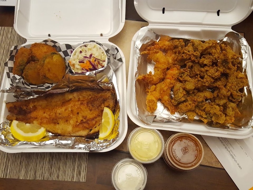Printed menu showing red snapper and macaroni salad.